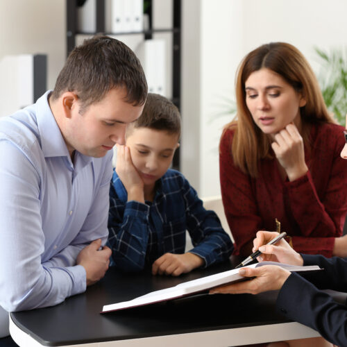 family law attorney meeting with co-parents and child